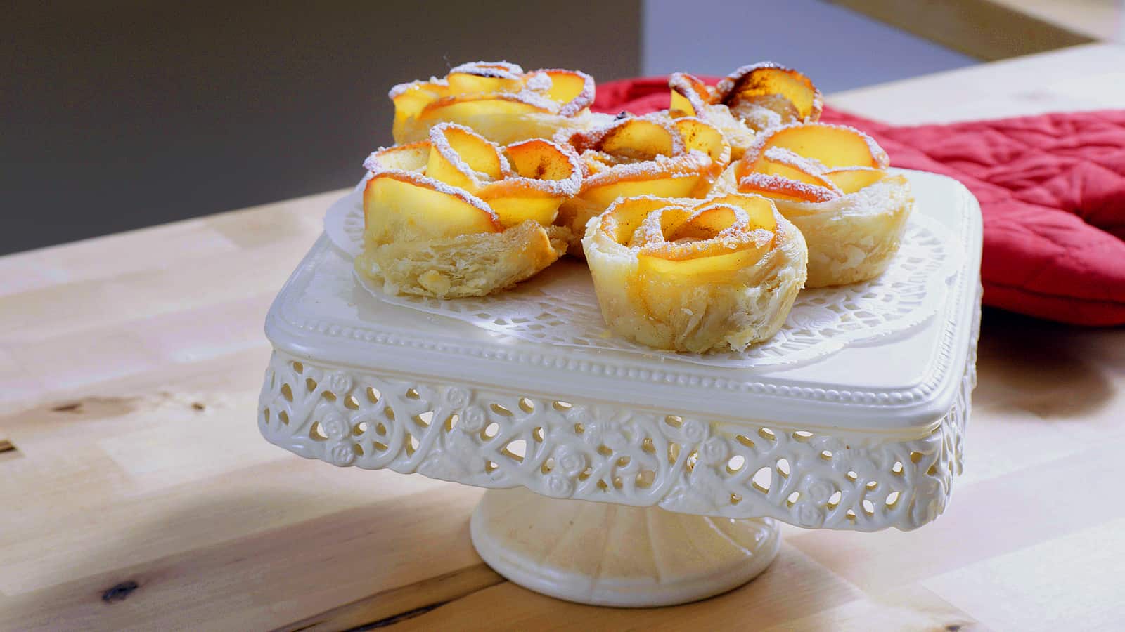 Baked in the toaster oven apple rose pastries arranged on the platter