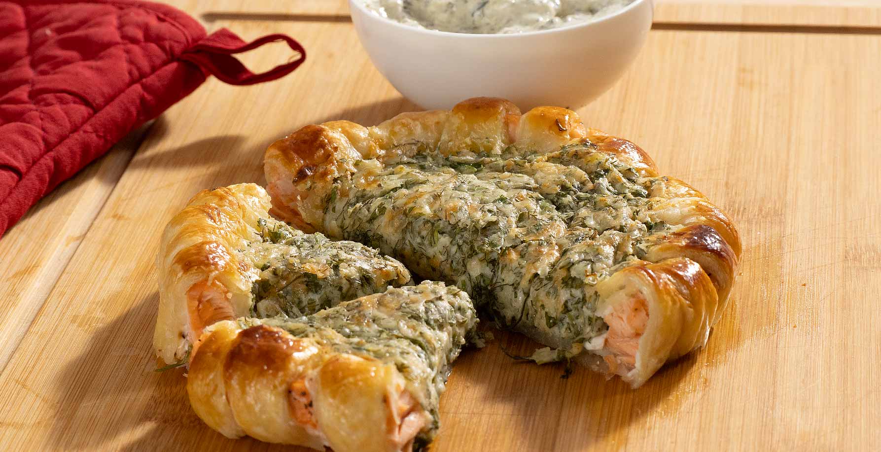 Baked Salmon Pie on the wooden board before serving