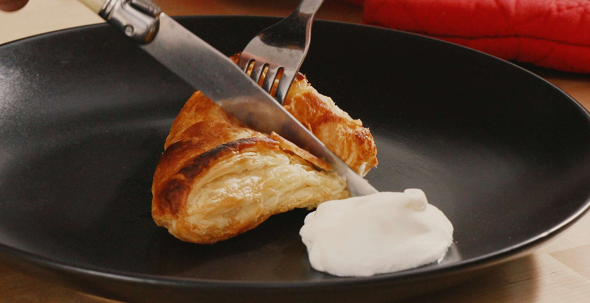 Bakery-style peach turnovers on the plate